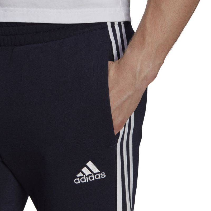 Adidas Essentials Tapered Cuff 3 Stripes M GK8977 pants Clothing/Training Adidas