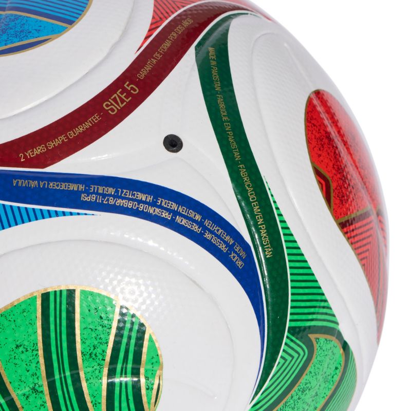 Full-design view of adidas World Cup 26 Trionda League J290 football, showing tournament-inspired graphics and white/royal/solar color palette.