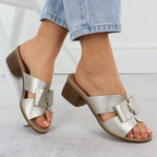 Women's leather slides on a block, gold Remonte R8759-90 Footwear Your Sports Performance