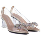 Transparent pumps with a bow on a decorative heel Vinceza 62275 Vinceza