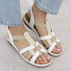 Comfortable women's slip-on sandals with elastic straps, white Rieker 65918-81 Footwear Your Sports Performance