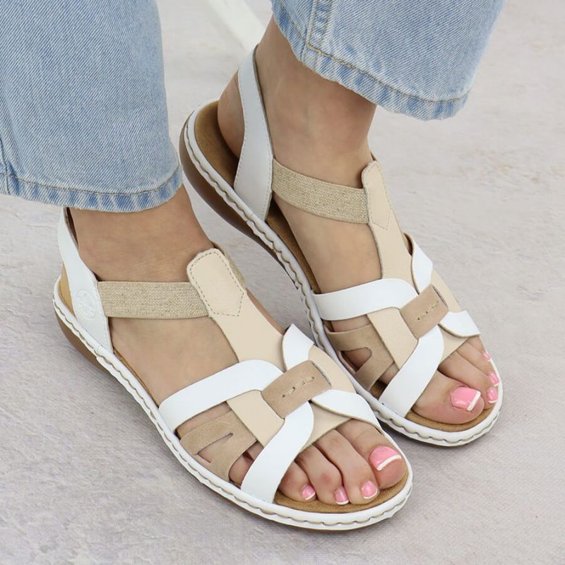 Comfortable women's slip-on sandals with elastic straps, white Rieker 65918-81 Footwear Your Sports Performance