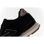 New Balance women’s 515 black suede leather sneakers