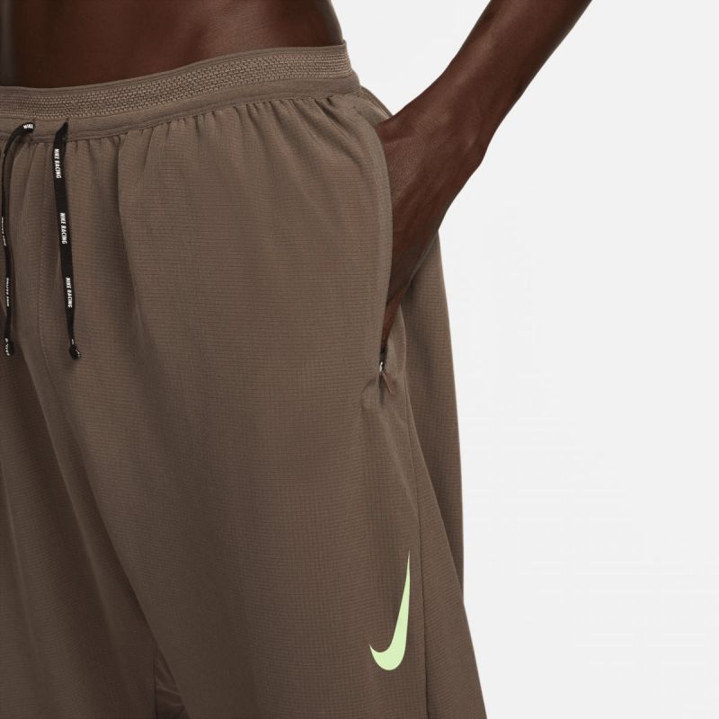 Nike Dri-FIT ADV AeroSwift W DM4615-004 pants Clothing/Running Nike