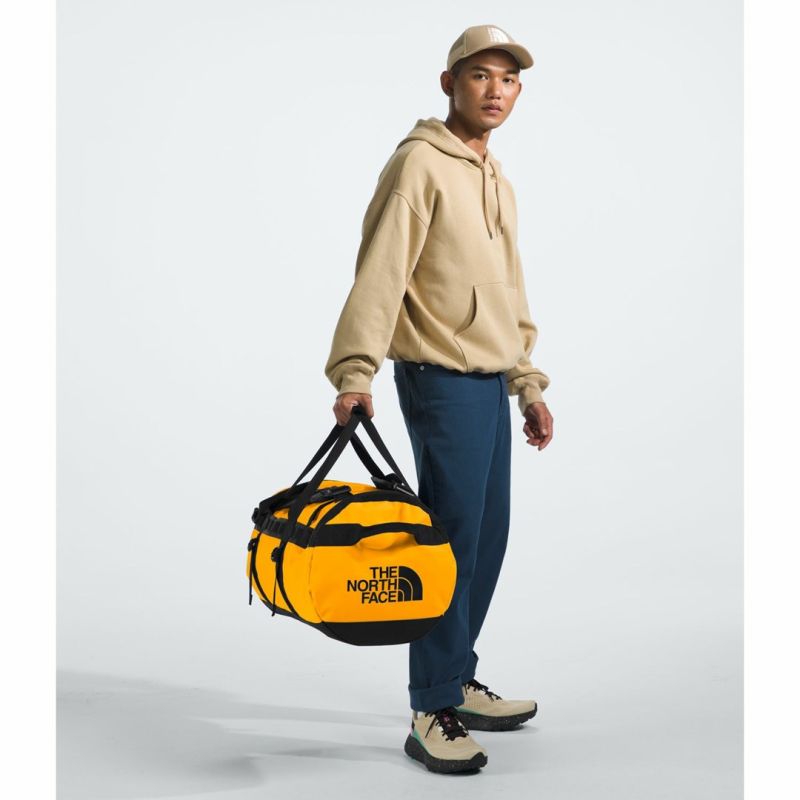 Base camp duffel bag m-summit gold-tnf black-npf THE NORTH FACE Bagaż/Walizki, torby, worki Your Sports Performance