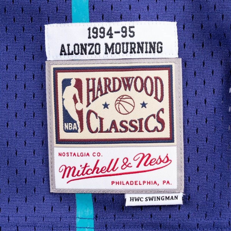 Mitchell & Ness NBA Charlotte Hornets Alonzo Mourning Swingman T-shirt - SMJYAC18010-CHOPURP94AMO Odzież/Odzież na co dzień Your Sports Performance