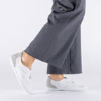 Women's leather openwork slip-on shoes, white Rieker 43663-80 Rieker