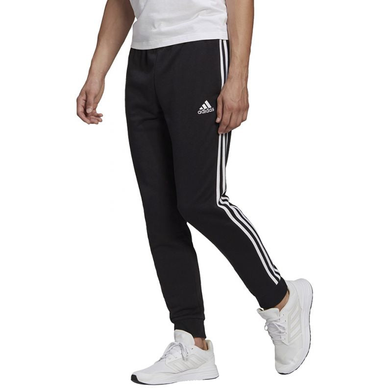 Adidas Essentials Tapered Cuff 3 Stripes M GK8831 Clothing/Lifestyle/Trousers, shorts Adidas