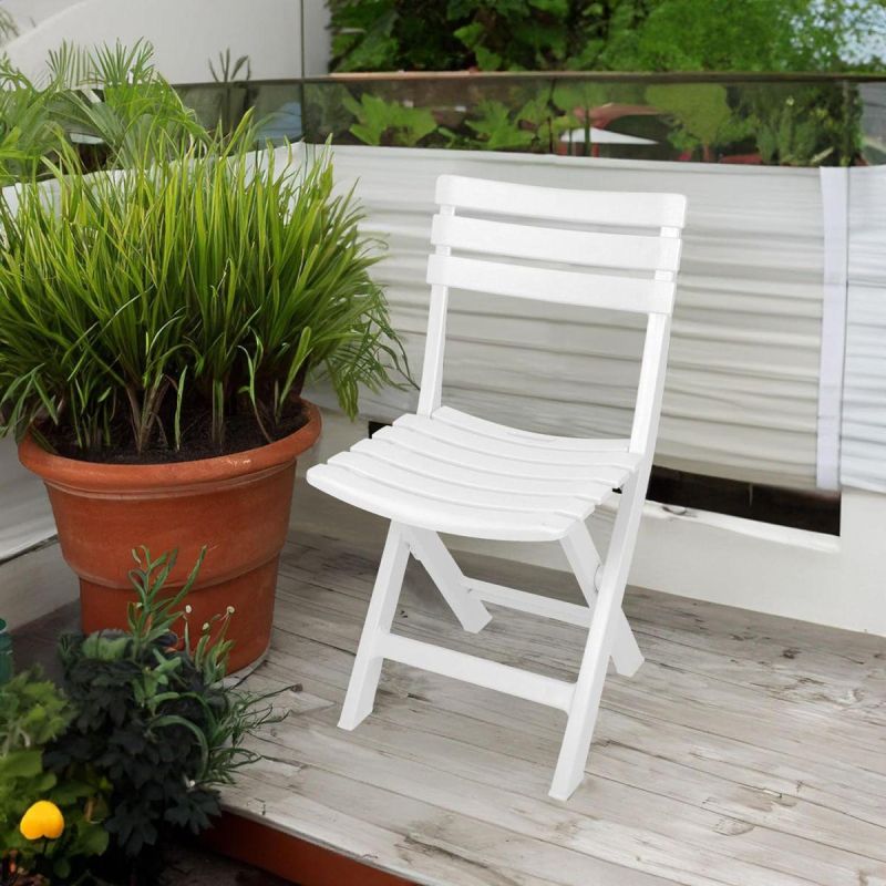 SET OF 4 KOMODO PLASTIC FOLDING CATERING CHAIRS WHITE Dom I Ogród/Meble Ogrodowe/Krzesła Your Sports Performance