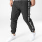 Karl Kani Og Tape Trackpants M 6006127 Clothing/Lifestyle/Trousers, shorts/Karl Kani Your Sports Performance