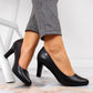 Black pumps on the W Sergio Leone post Footwear/Outdoor/Alpinus Your Sports Performance