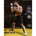 M Shin Guards - Undefeated Ochraniacze piszczeli Your Sports Performance