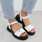 Women's leather sandals with a thick sole and a butterfly, white Filippo DS6811 Footwear Your Sports Performance