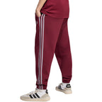 Men's adidas Essentials 3-Stripes Fleece Tapered Cuffed Pants Burgundy KY4134