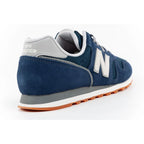New Balance 373 men’s sports shoes, navy leather sneakers