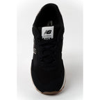 New Balance women’s 515 black suede leather sneakers