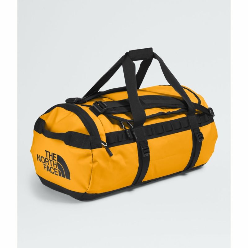 Base camp duffel bag m-summit gold-tnf black-npf THE NORTH FACE Bagaż/Walizki, torby, worki Your Sports Performance